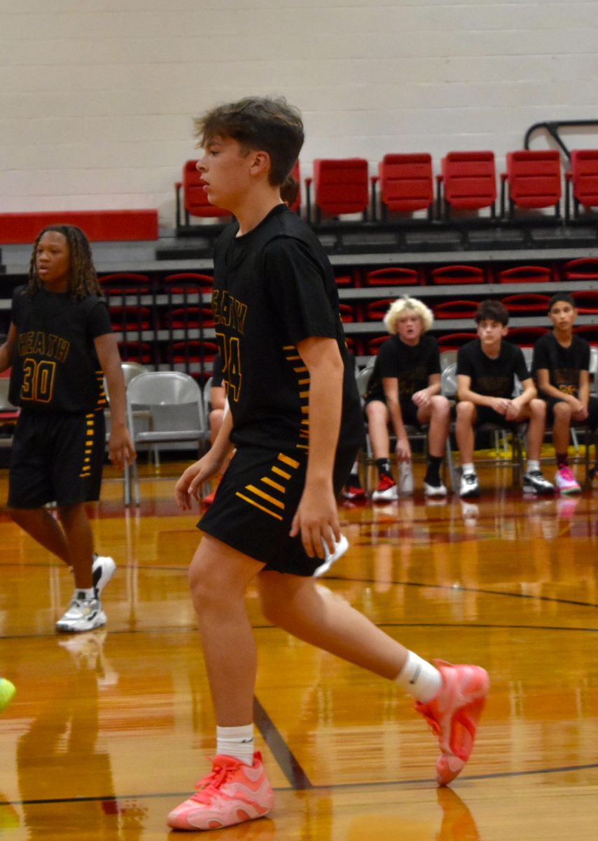 My little brother, James Ricketts, playing basketball for his seventh grade middle school team. This game was at Reidland Middle School. "I was glad Alli took photos of me.", James Ricketts said.  