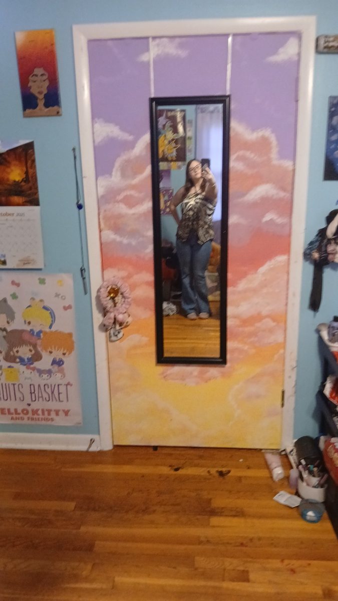 Katelyn McNeely posing for a picture in her friend Brielle Hess´s room. On October 26th the two friends hung out when seeing her outfit Brielle commented ¨dangg okay girl you ate.¨