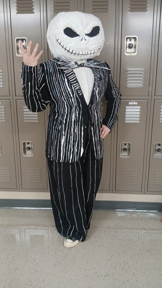 Student Felix Lee posing for a photo as Jack the Pumpkin King for Halloween. On October 31st, MCHS allowed students to dress up in their Halloween costumes. Felix made the costume from home.  